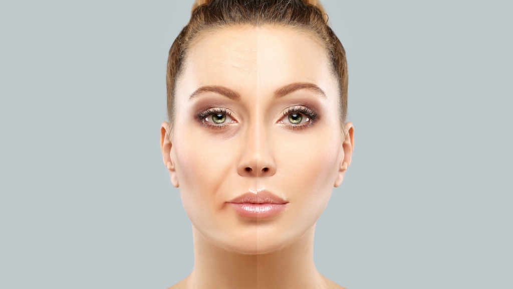 Podeljeno lice žene prikazuje razliku između zdrave i umorne kože pod uticajem zagađenja